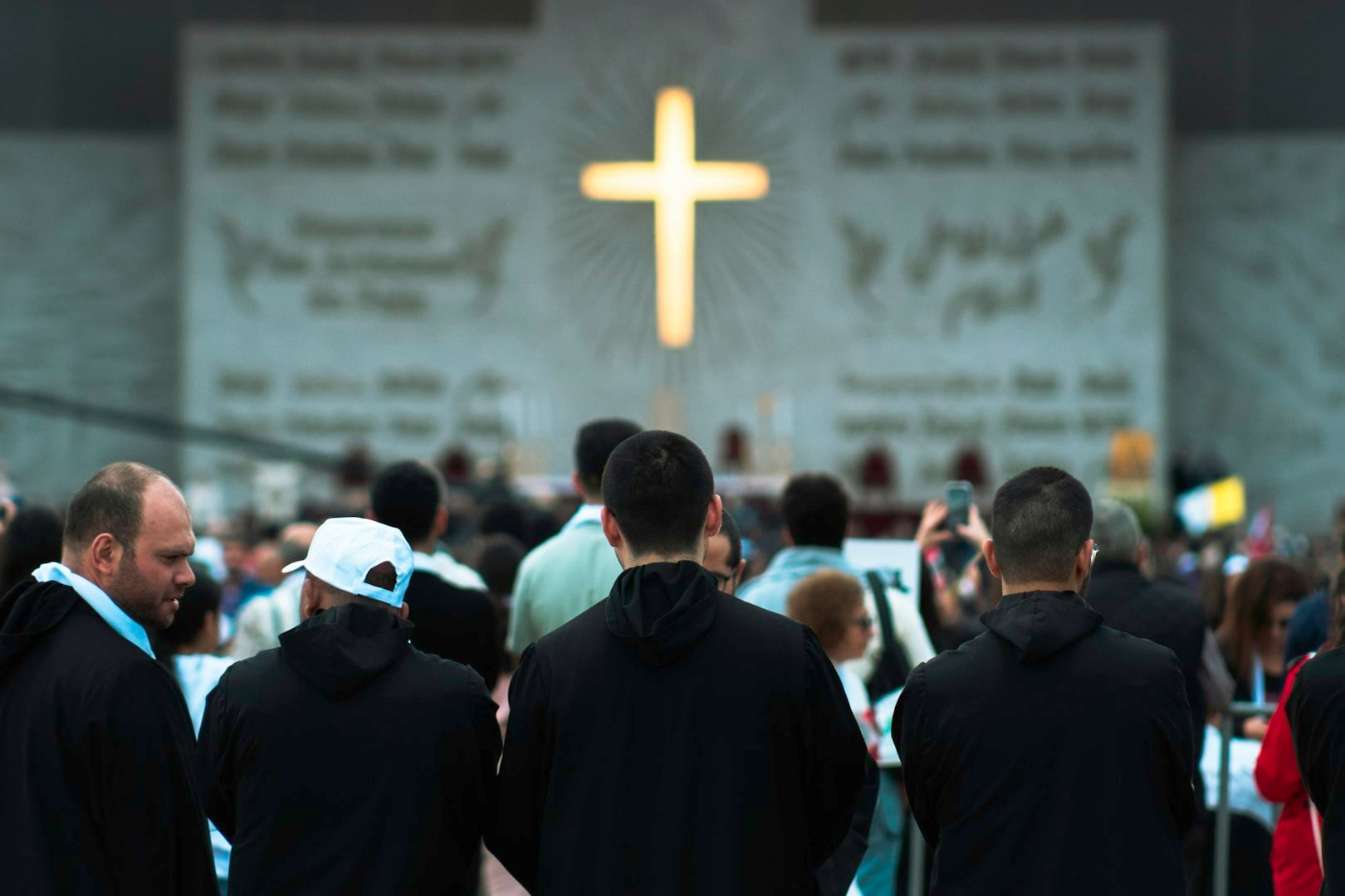 A religious community joining in prayer and worship, sharing faith, support, gratitude, peace, love, and hope together.